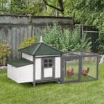 A chicken coop in a yard.