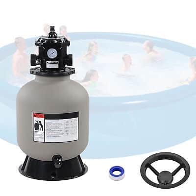 A swimming pool with a sand filter and a pump.