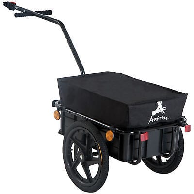 A black cart with a black cover.