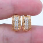 Gold plated cubic zirconia hoop earrings.