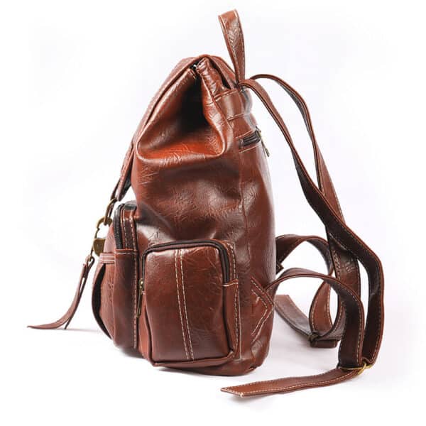 A brown leather backpack on a white background.