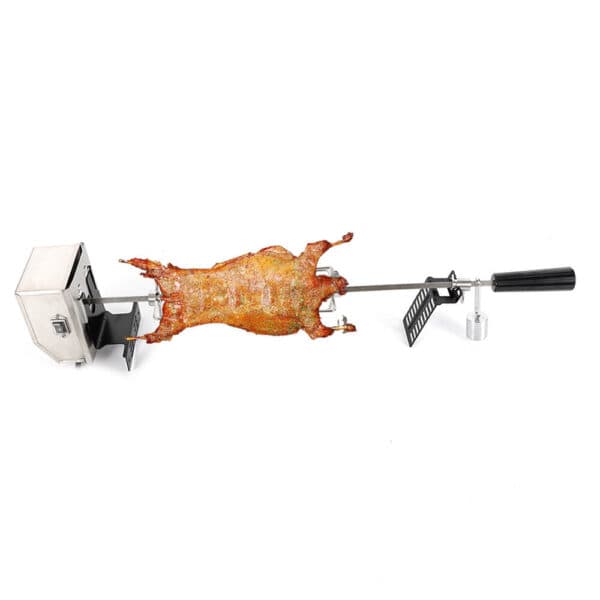 A rotisserie with a meat hanging from it.