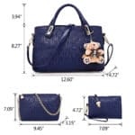 A blue handbag set with a teddy bear.