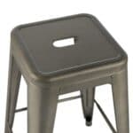 Metallic gray stool with a central carrying handle.