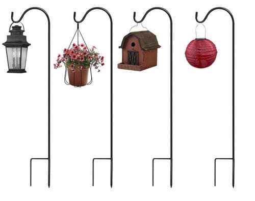 A set of four metal garden stakes with hanging lanterns and a birdhouse.