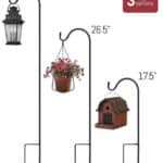 A set of three planters with different sizes of pots and lanterns.