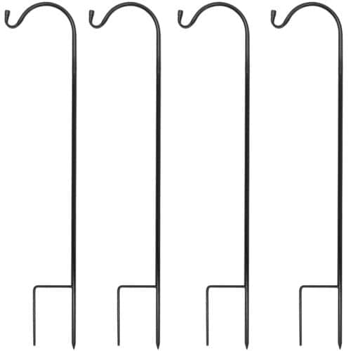 A set of four black metal hooks on a white background.