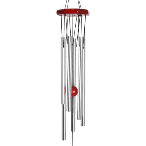 A wind chime with a red ball hanging from it.