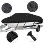 A black boat cover for a boat trailer.