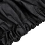 A close up of a black skirt with ruffles.