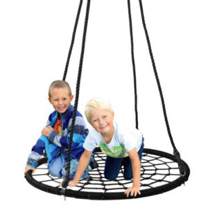 Two children playing on a spider web swing.