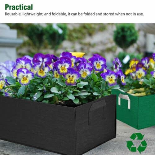 A black planter box with purple pansies in it.