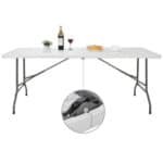 A white folding table with a bottle of wine.