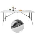 A white folding table with a bottle of wine.