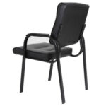 A black leather guest chair with a metal frame.