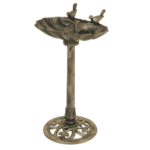 A bird bath on a stand with a bird on it.