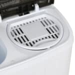 A small white washing machine with a lid.