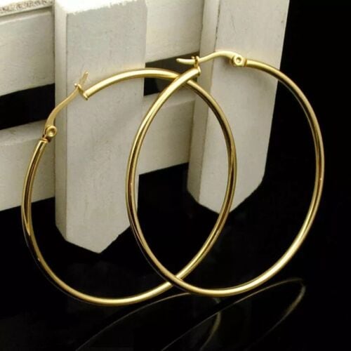 A pair of gold plated hoop earrings.