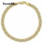 A gold chain bracelet with the words trendmax.