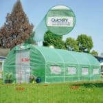 A green greenhouse with measurements and measurements.