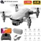 The 4k dual camera drone with a remote control and other accessories.