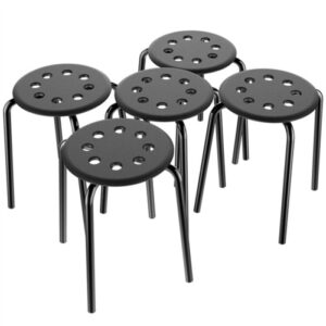 A set of black plastic stools with holes in them.