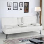 A white couch in a room.