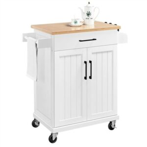 A white kitchen cart with a tea pot and a teacup on it.