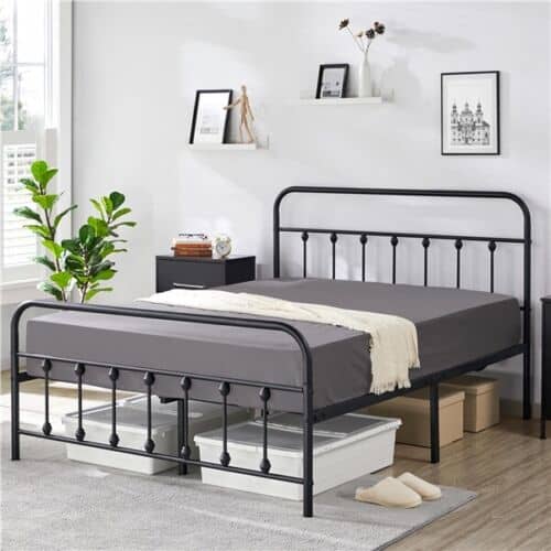 A bed with a metal frame.
