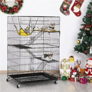 A cat cage with a tree and decorations.