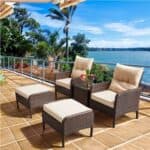 A patio with chairs and a table.