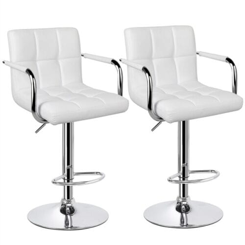 A pair of white chairs.