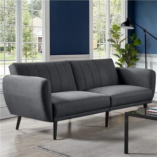 A grey couch in a room.