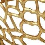 A close up of a gold - plated basket.