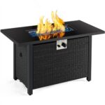 A black fire pit with flames on top.