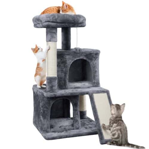 Two cats are playing on a scratching tower.