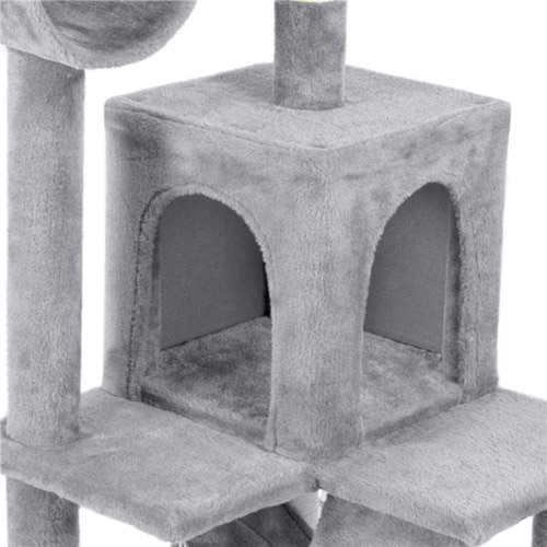 A grey cat scratching tower with three levels.