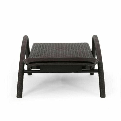 A black rattan lounge chair on a white background.