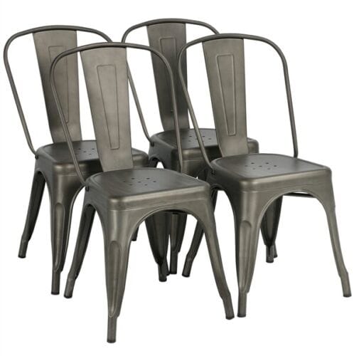 A set of four gray metal dining chairs.