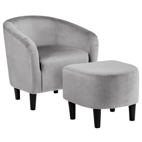 A grey velvet chair and ottoman set.