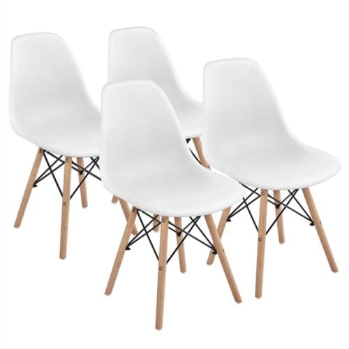 Four white eames chairs with wooden legs.
