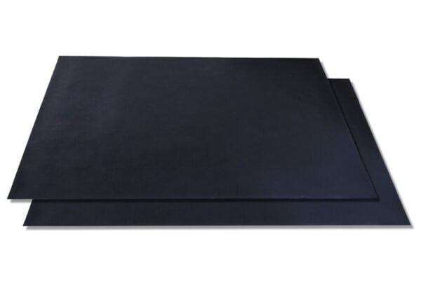 A pair of black rubber mats on a white background.