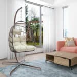 A rattan swing chair in a living room.