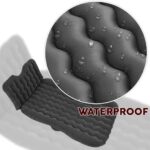 Waterproof sock with water droplets indicating its water-resistant feature.