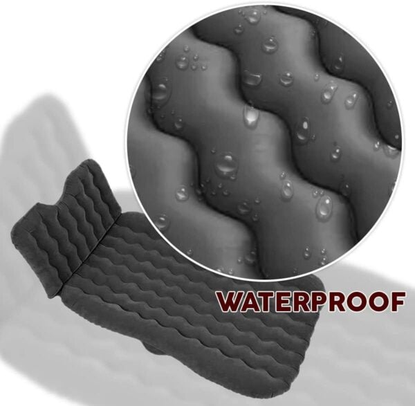 Waterproof sock with water droplets indicating its water-resistant feature.