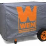 Portable generator covered with a branded protective cover.