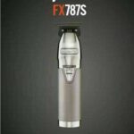 Babylisspro fx787s metal lithium outliner, a professional hair trimmer with a metallic finish, displayed on a gray background.