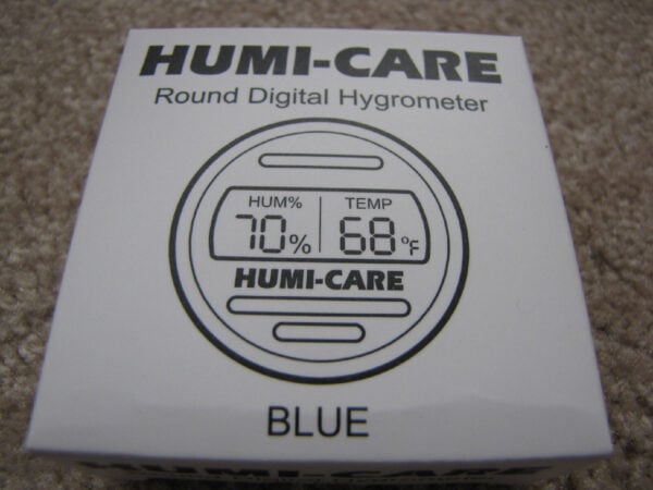 A digital hygrometer displaying 70% humidity and a temperature of 68 degrees fahrenheit.