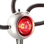 A novelty desk lamp designed to resemble a red robotic eye with two flexible metal arms.