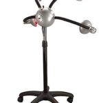 Novelty desk lamp designed to resemble a humanoid figure, featuring a spherical silver head with light bulbs as eyes, and adjustable limbs on a black tripod base.